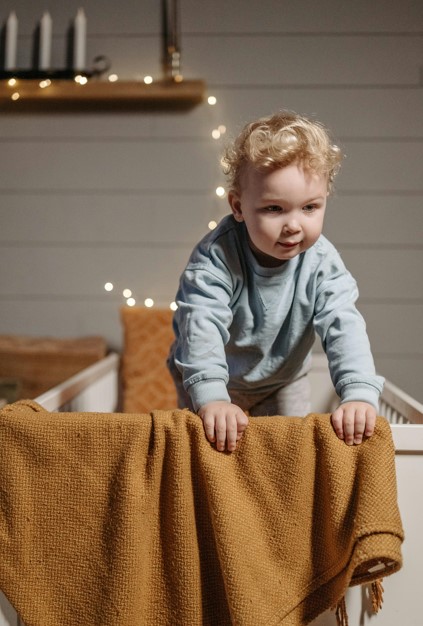 Climbing out of the crib
